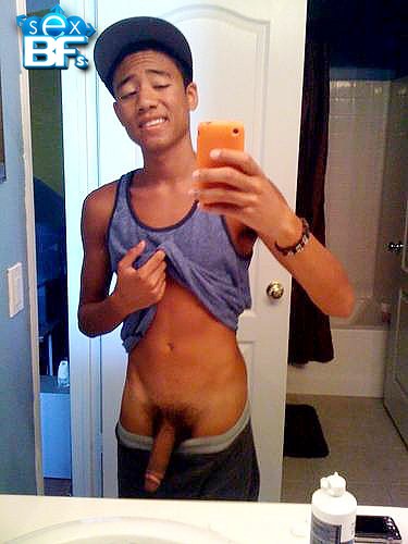 black teenboy shows his penis